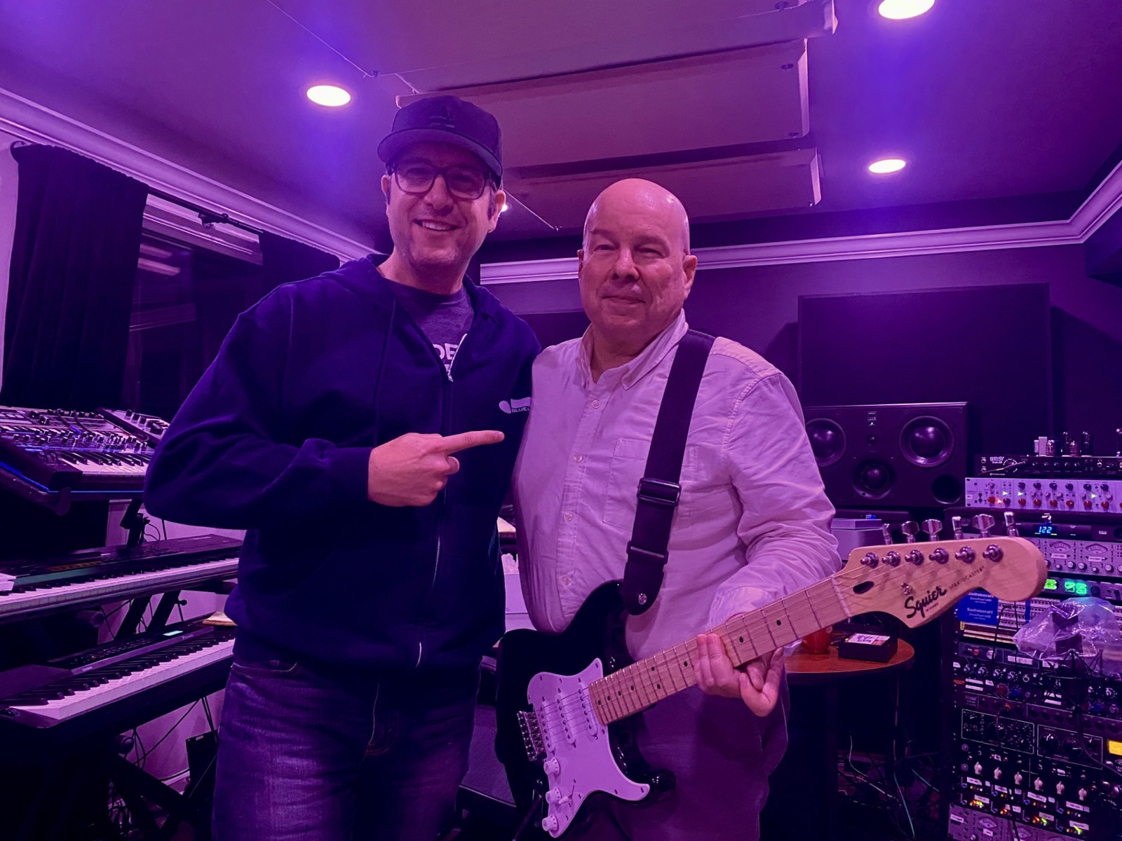 Dave Tough and guitarist Mark East in the studio